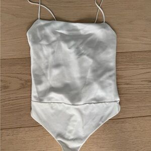 Alice + Olivia White Bodysuit One Piece- NWOT- never worn